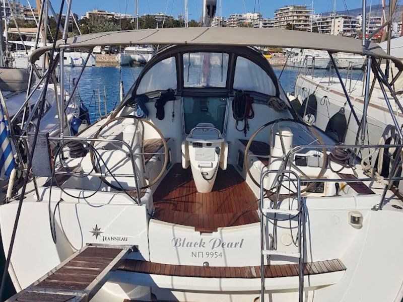 Photo #1 - Sun Odyssey 42i (Black Pearl) в Alimos Marina - 10761